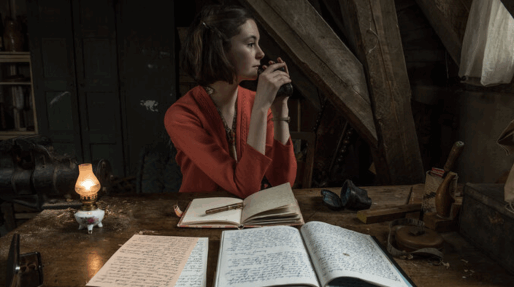 Anne Frank looking out of the window