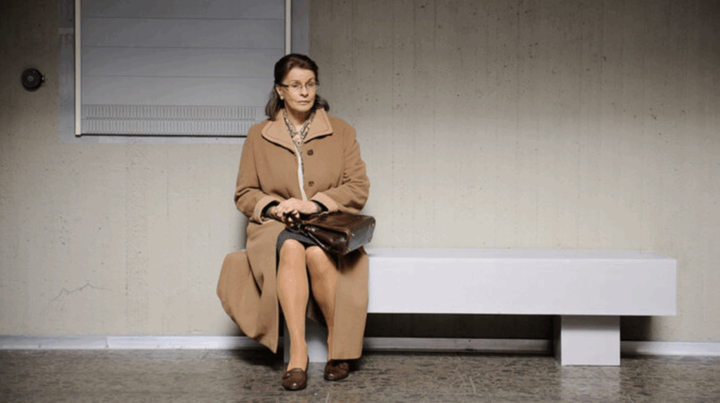 Frau Böhm sitting on a bench